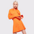 Unleash your style with this stunning Pinko Short Cotton Poplin Shirt Dress. Featuring a shirt collar, breast pockets, pleating in the front, and long sleeves with flared cuffs, this head-turning dress cinches at the waist and flares at the skirt. The eye-catching orange colour adds the perfect finishing touch. The orange colour is the perfect pop of colour for the warmer months. Wear it and turn heads!