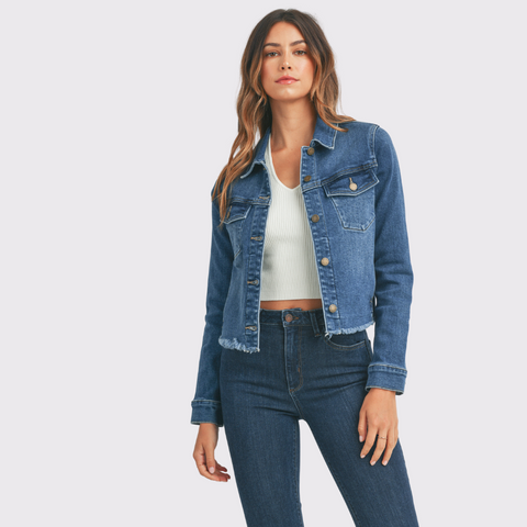 The Fitted Fray Jacket by Just Black Denim provides all the classic style of denim while giving you a new, modern look. It has a frayed hem for a cool, casual feel that you can pair with denim in the same colour to pull off the classic Canadian tuxedo look. Easily dressed up or down, this denim jacket is a must-have piece for every wardrobe. Utilize this piece as a light layer on the cooler summer evenings, or as an everyday piece in the fall.